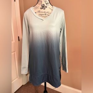 White faded into dark gray. This is a workout top.